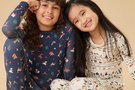 happy family in matching pjs